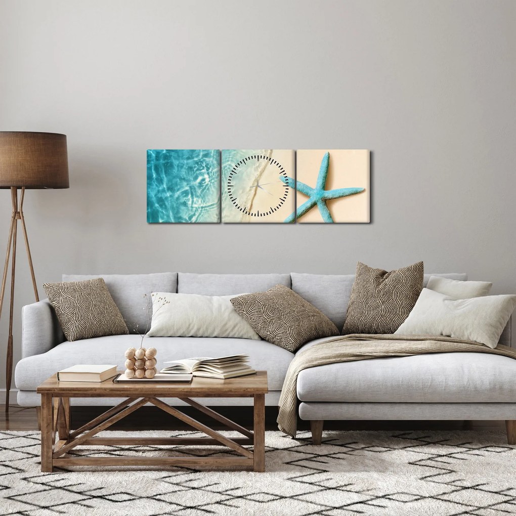 Obraz - Rozgwiazda na plaży (z zegarem) (90x30 cm)