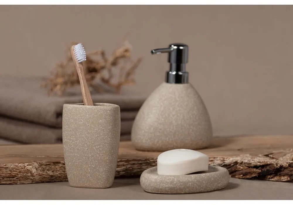 Beżowy ceramiczny kubek na szczoteczki do zębów Wenko Pion