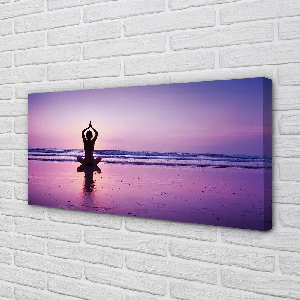 Fotoobraz na płótnie Kobieta Uprawiająca Jogę nad Morzem