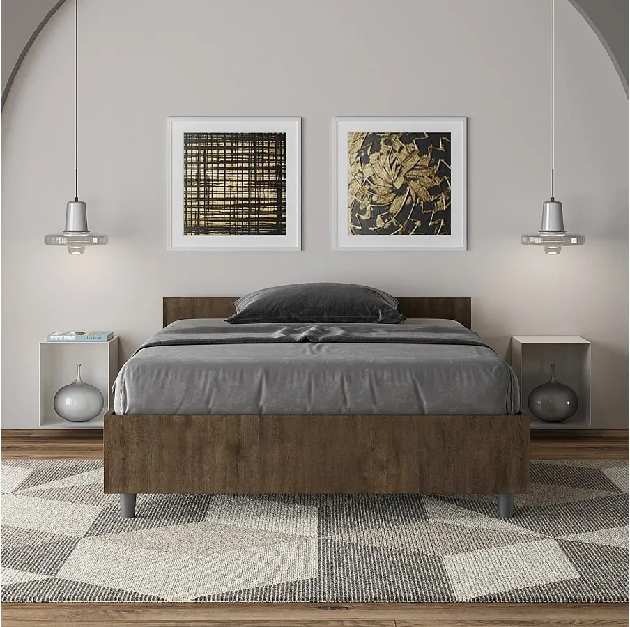 Łóżko wyposażone w stelaż z listwami 120x190 orzech Nuamo