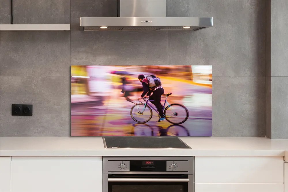 Szklany Panel Człowiek i Rower w Blasku Świateł