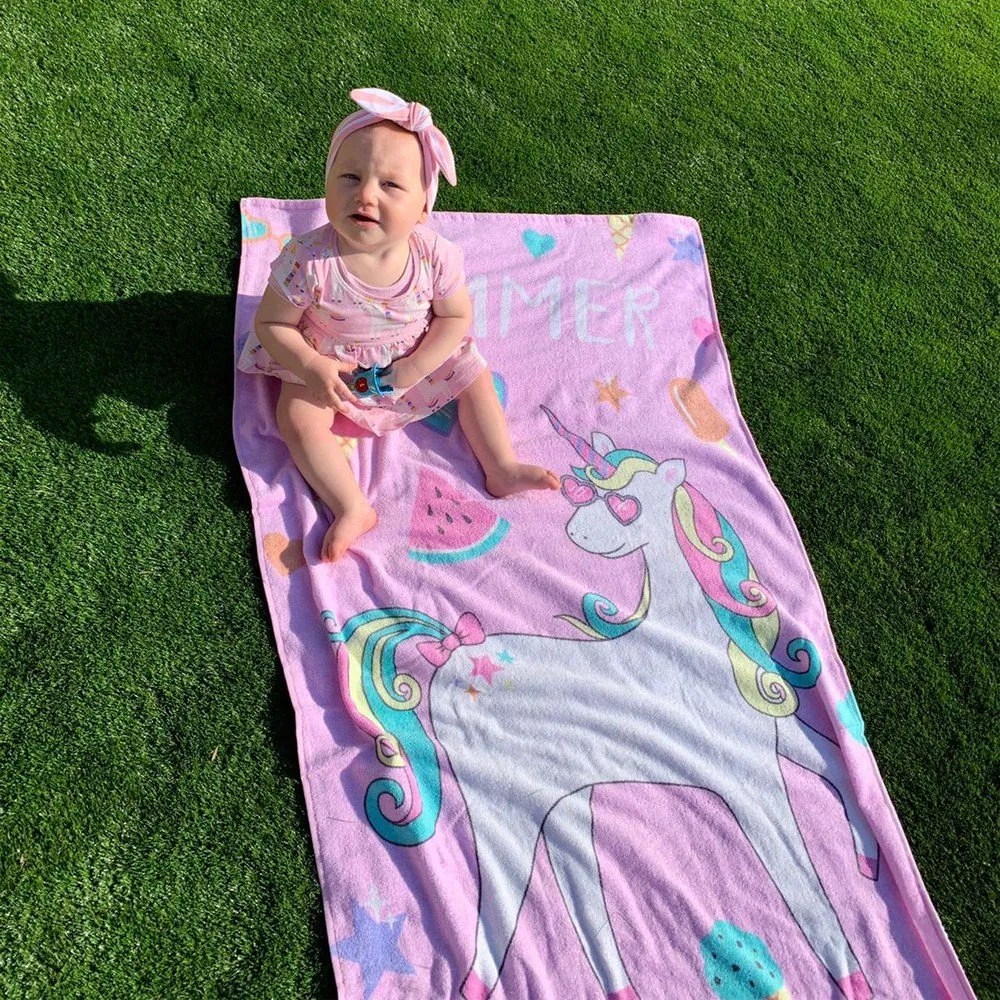 Różowo-fioletowy bawełniany ręcznik plażowy 76x160 cm Summer Unicorn – Catherine Lansfield