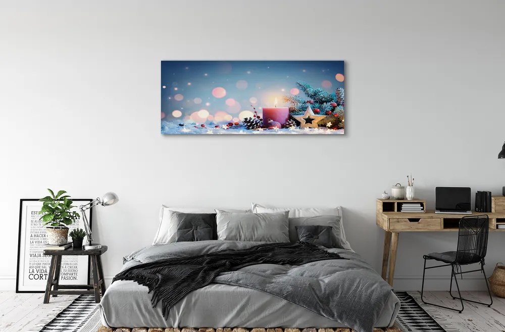 Obraz drukowany na płótnie Świeca i Śnieg w Świątecznej Scenerii