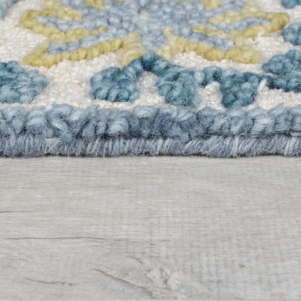 Niebiesko-kremowy dywan z mieszanki wełny tkany ręcznie 120x170 cm Myla Floral Frame – Flair Rugs