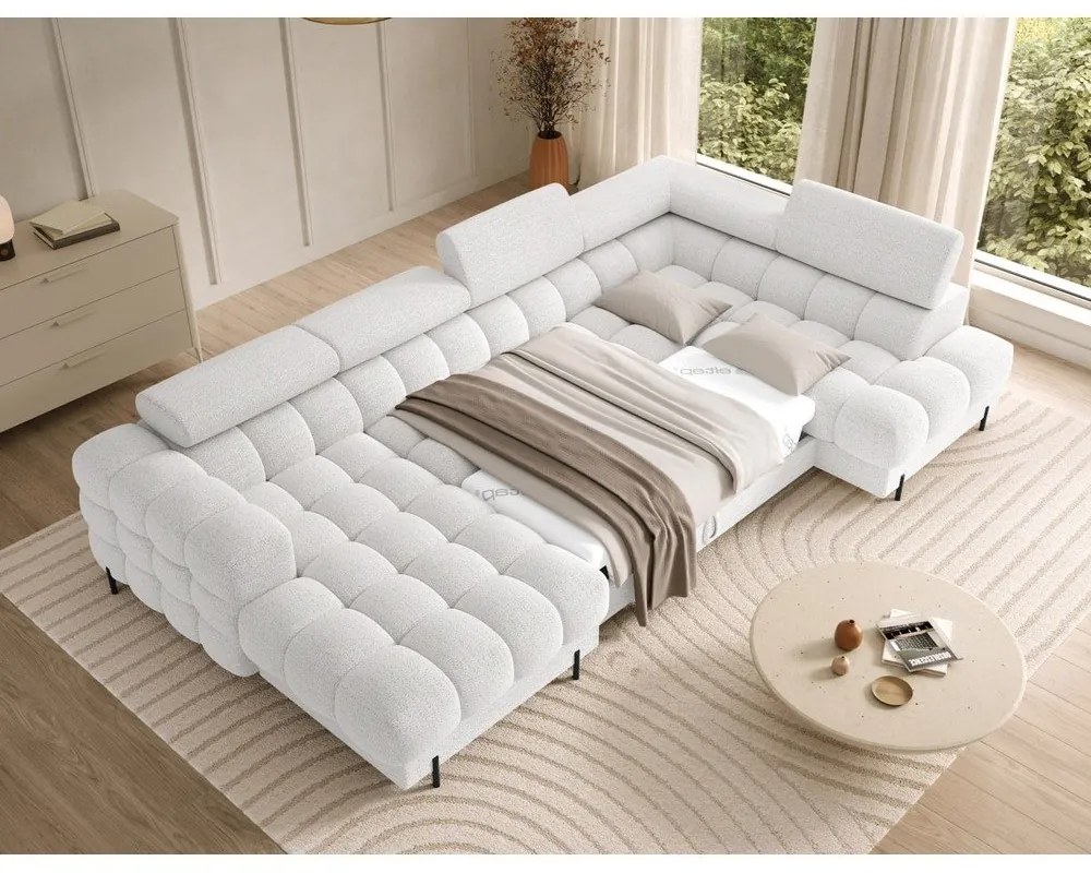 Kremowy rozkładany narożnik z materiału bouclé (prawostronny/w kształcie litery U) Feraria – ELTAP