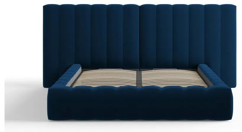 Ciemnoniebieskie tapicerowane łóżko dwuosobowe ze schowkiem i stelażem 160x200 cm Gina – Milo Casa