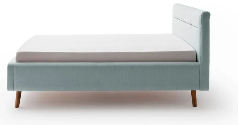 Jasnoniebieskie tapicerowane łóżko dwuosobowe ze schowkiem i stelażem 140x200 cm Lotte – Meise Möbel