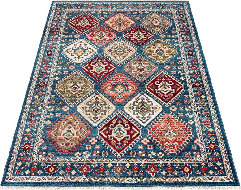 Prostokątny niebieski dywan w geometryczne wzory M0-P11