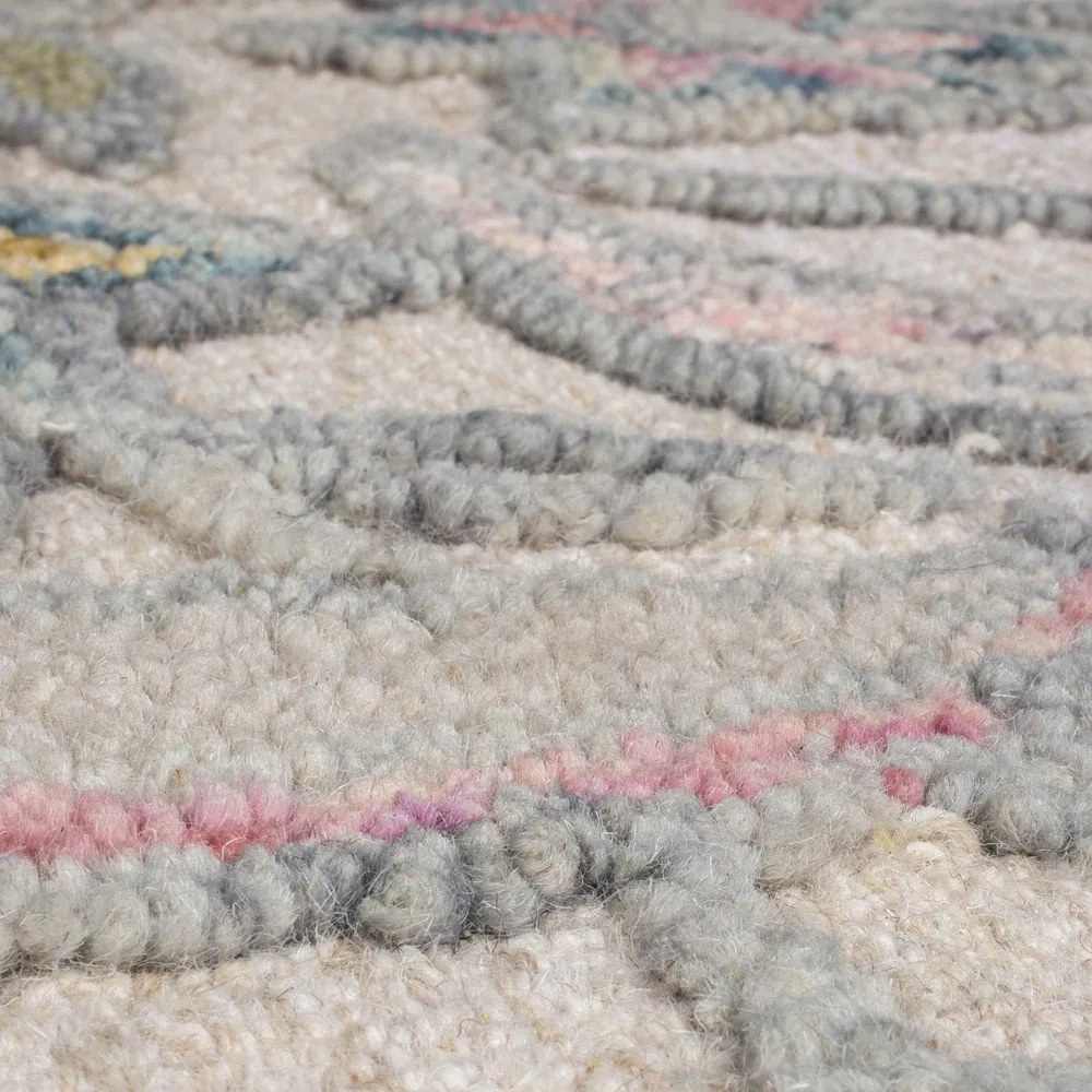 Kremowy wełniany dywan tkany ręcznie 120x170 cm Tania Floral – Flair Rugs