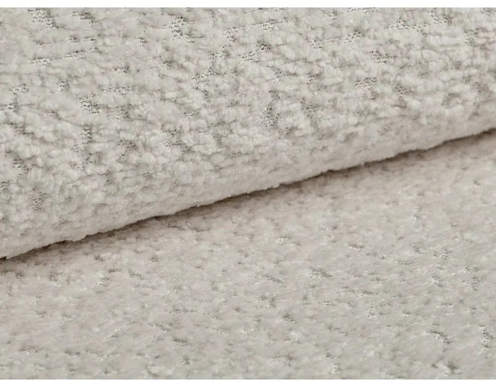 Beżowa poduszka na sofę z materiału bouclé Kemi – Cosmopolitan Design