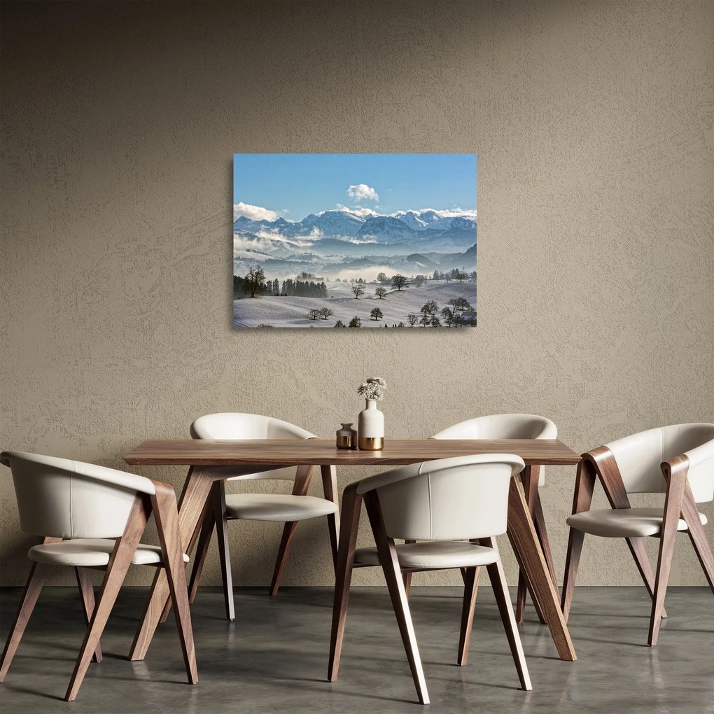 Obraz na szkle ośnieżonych gór (70x50 cm)