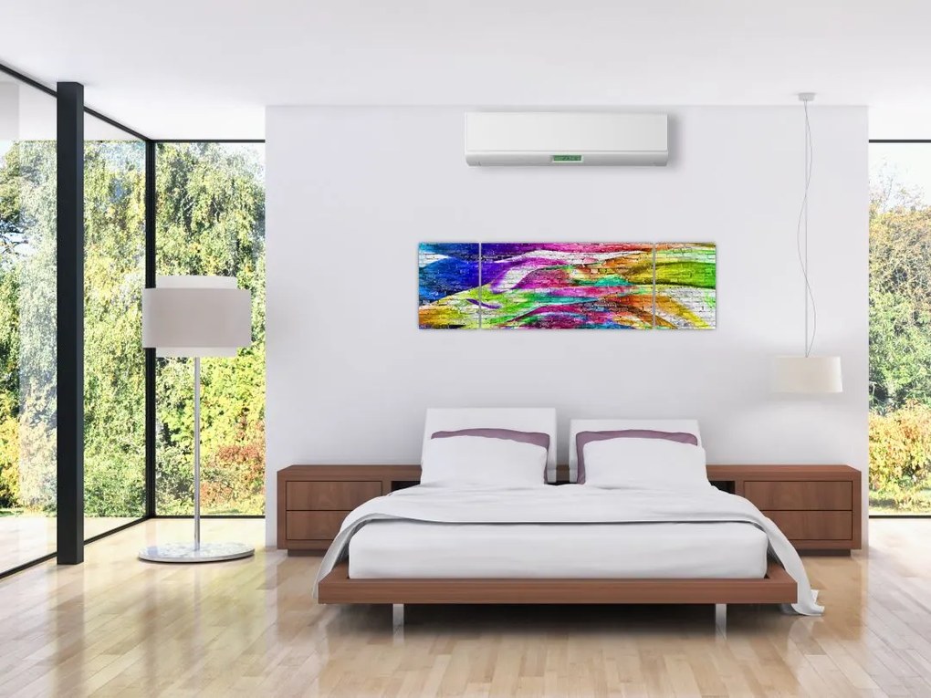 Obraz - Mur z cegły z kolorowymi płomieniami (170x50 cm)