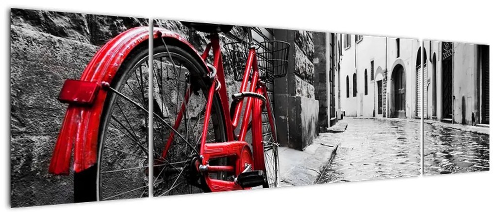 Obraz czerwonego roweru na brukowanej uliczce (170x50 cm)