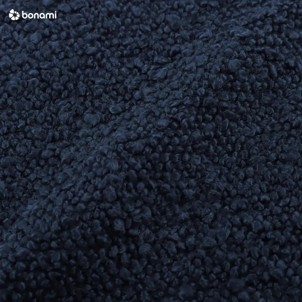 Ciemnoniebieska rozkładana sofa ze schowkiem z materiału bouclé 222 cm Bali – Cosmopolitan Design