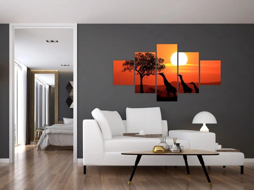 Obraz żyraf o zachodzie słońca (125x70 cm)