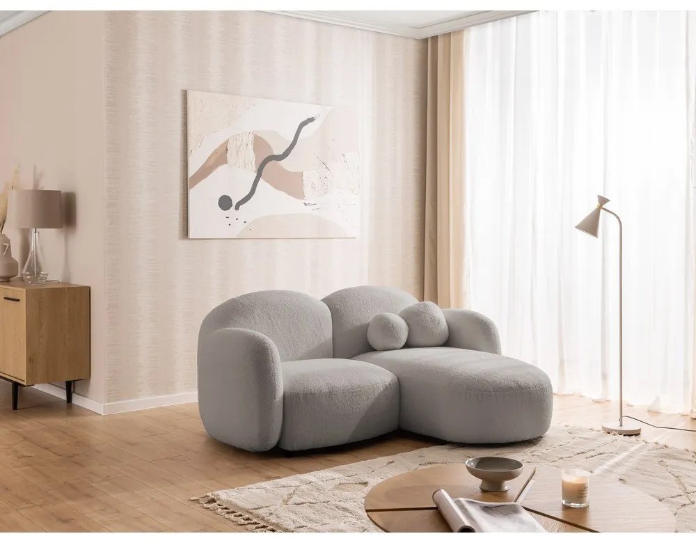 Szary narożnik z materiału bouclé (prawostronny/z szezlongiem) Orbit – Ropez