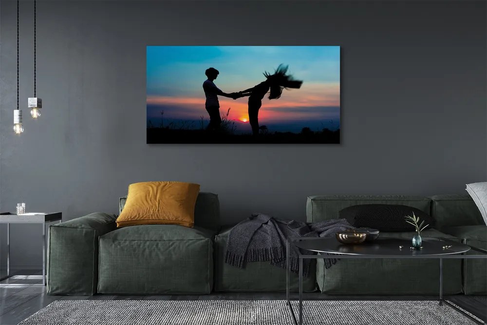 Fotoobraz na płótnie Ludzie na Tle Zachodu Nieba