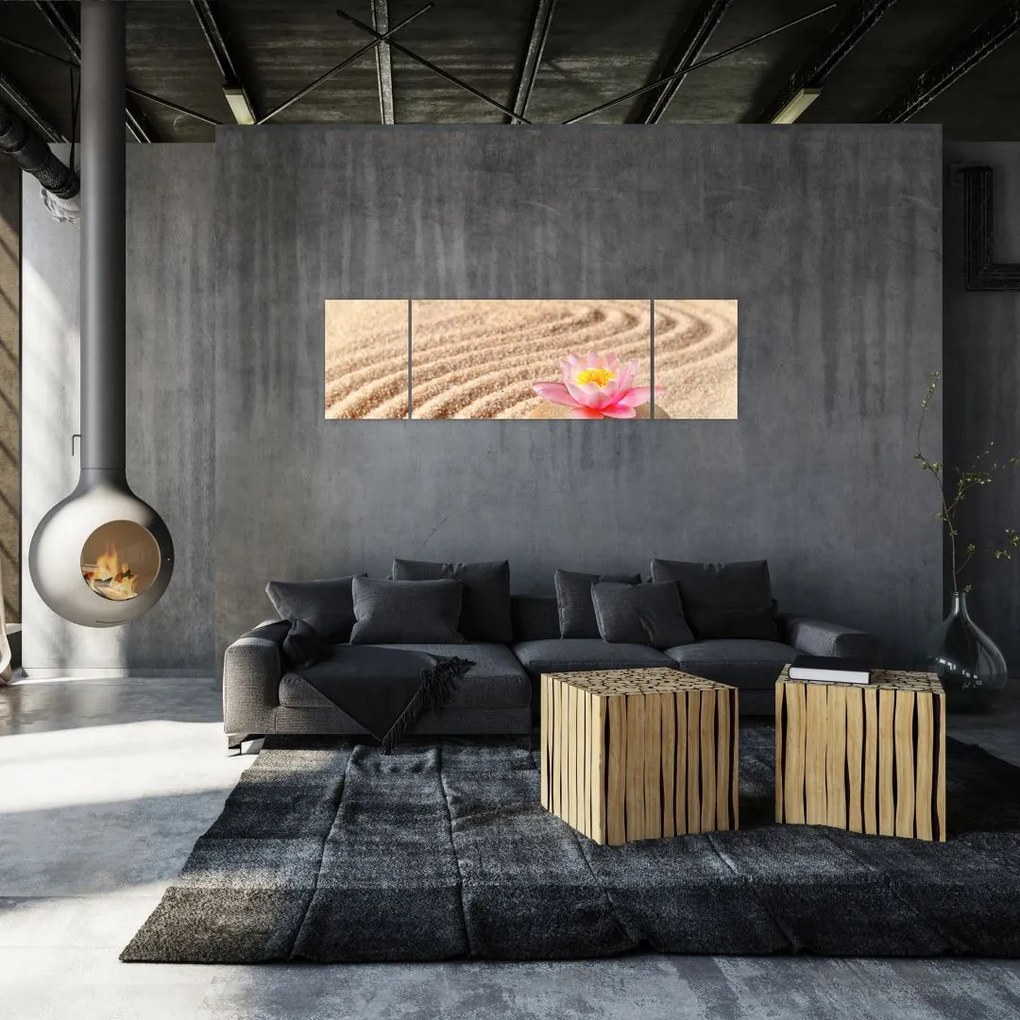Obraz kamienia z kwiatem na piasku (170x50 cm)