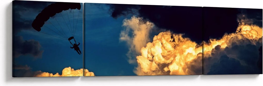 Obraz skoczka spadochronowego w chmurach (170x50 cm)