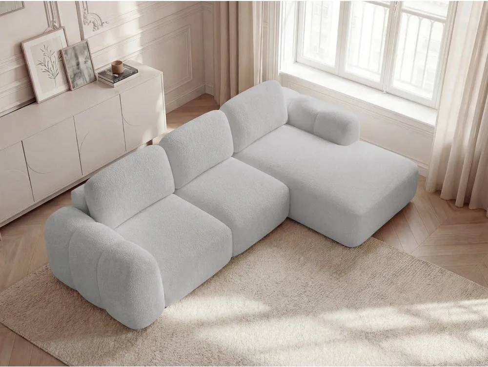 Jasnoszary rozkładany narożnik z materiału bouclé ze schowkiem (prawostronny/z szezlongiem) Montaigne – Bobochic Paris