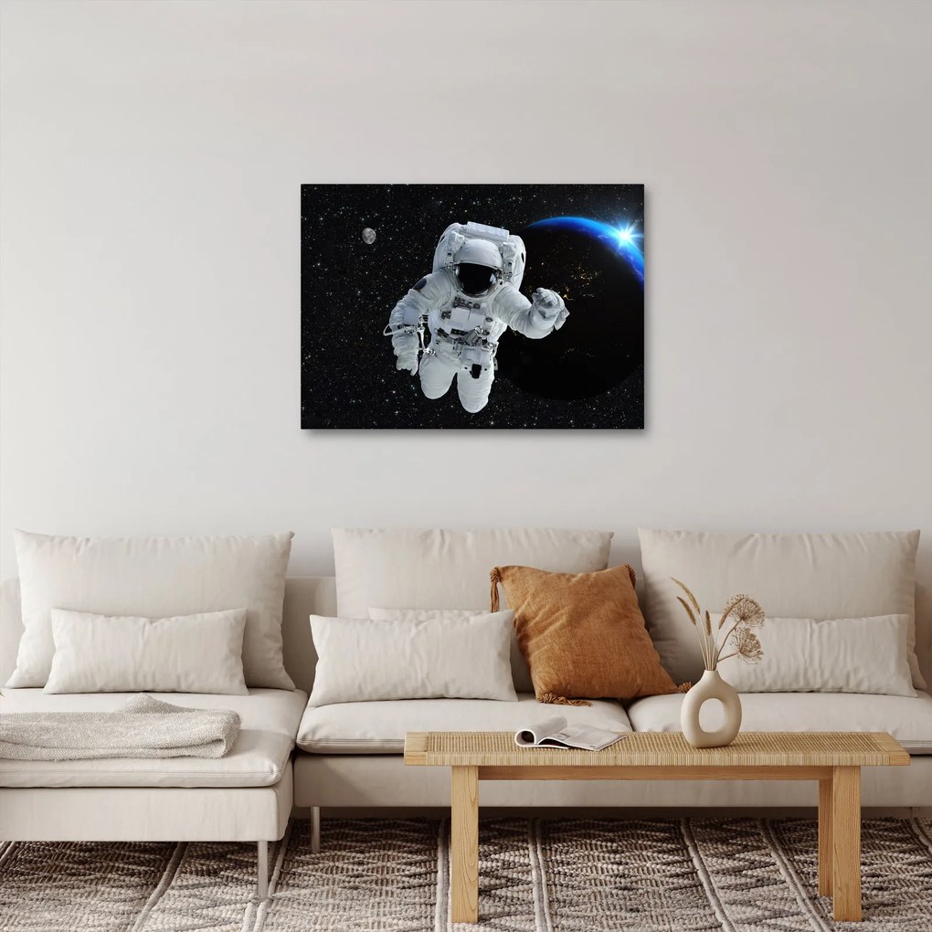 Obraz - Astronauta w kosmosie (70x50 cm)