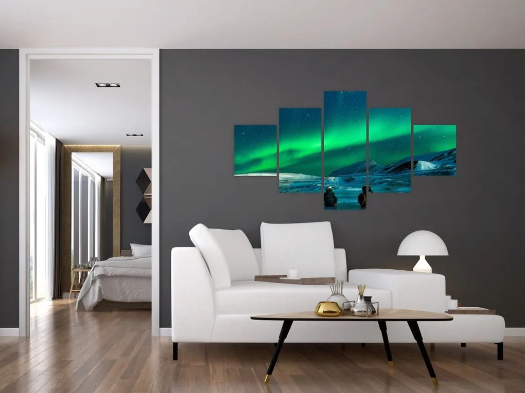 Obraz ludzi w pobliżu zorzy polarnej (125x70 cm)