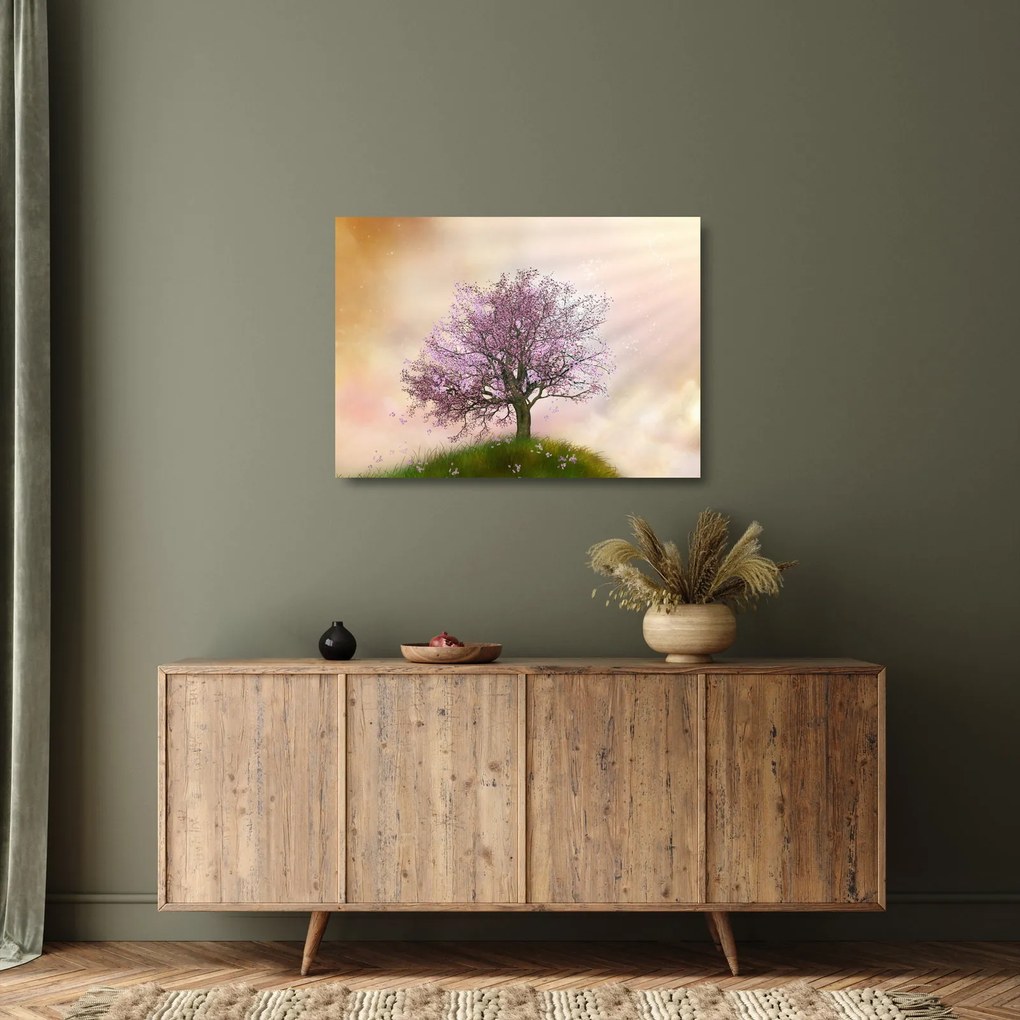 Obraz na szkle kwitnącego drzewa na szczycie wzgórza (70x50 cm)