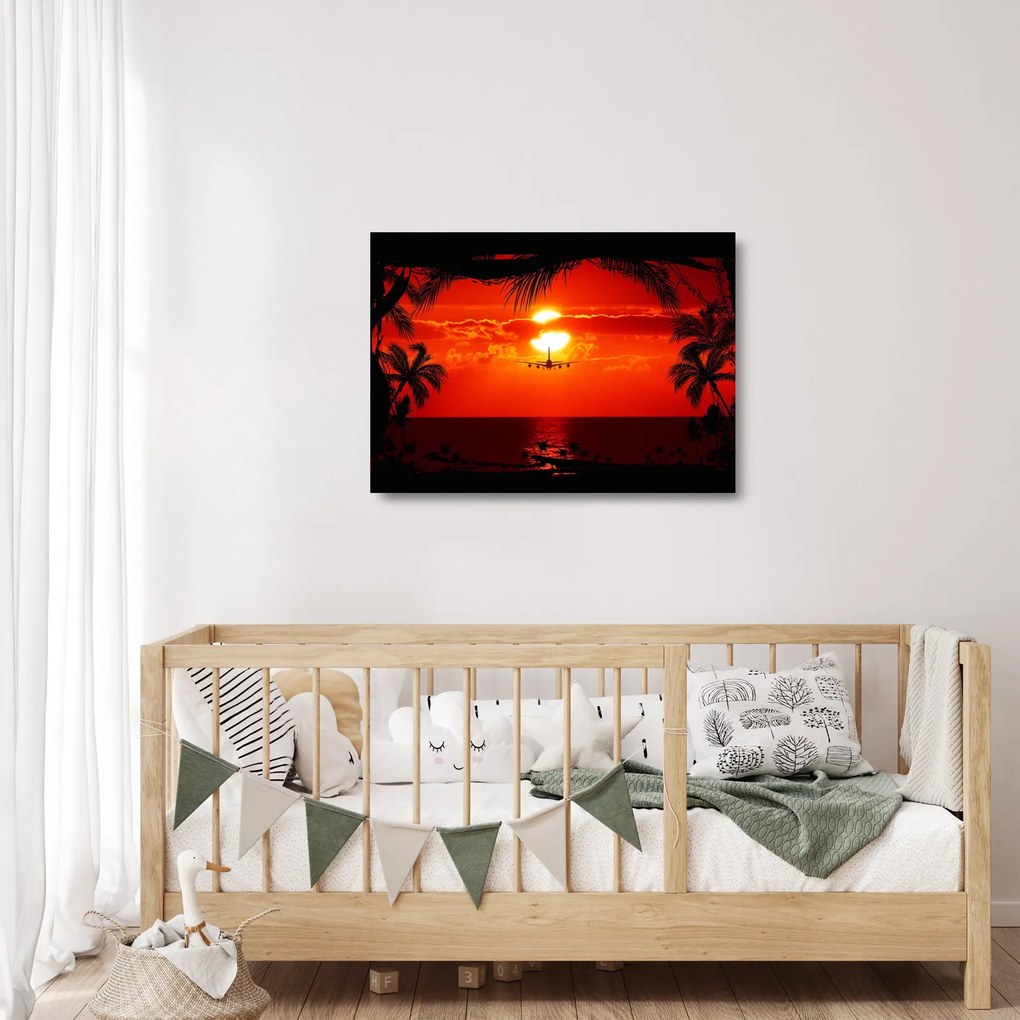 Obraz na szkle - zachód słońca z samolotem (70x50 cm)
