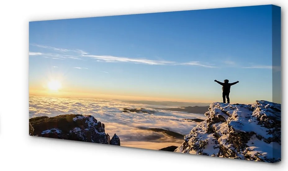 Obraz canvas na ścianę Człowiek w Górach o Wschodzie