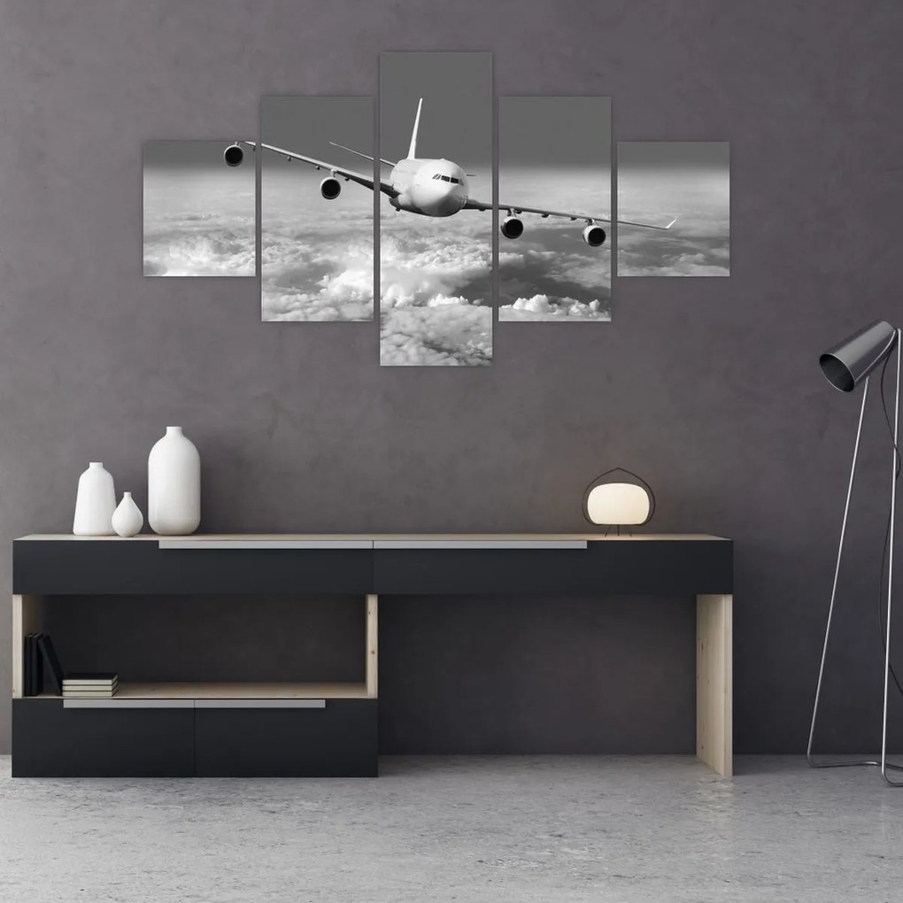 Obraz - Samolot w chmurach, czarno-biały (125x70 cm)