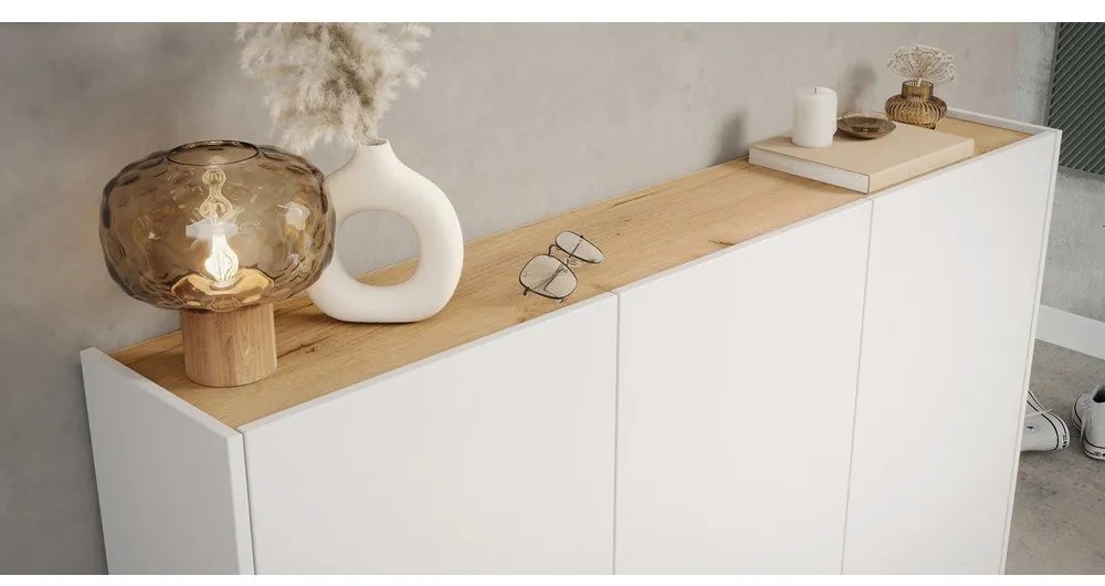 Biała szafka w dekorze dębu 138x105x25 cm Libbiano – Germania