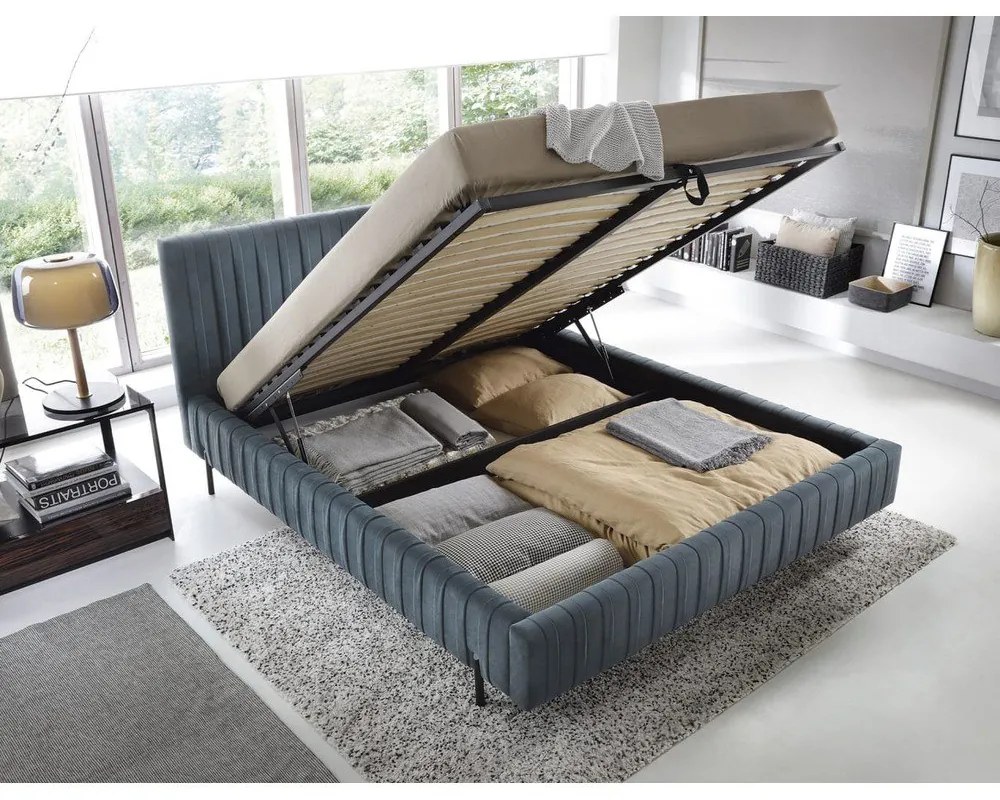 Niebieskie tapicerowane łóżko dwuosobowe ze schowkiem ze stelażem 180x200 cm Plissa – ELTAP