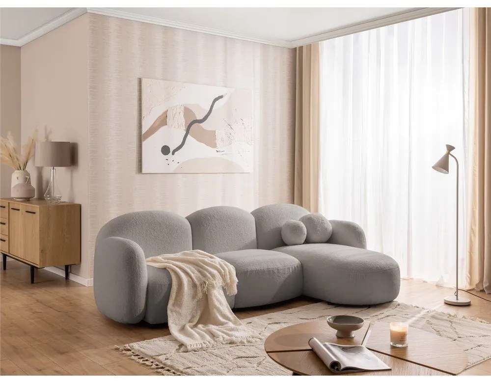 Szary narożnik z materiału bouclé (prawostronny/z szezlongiem) Orbit – Ropez