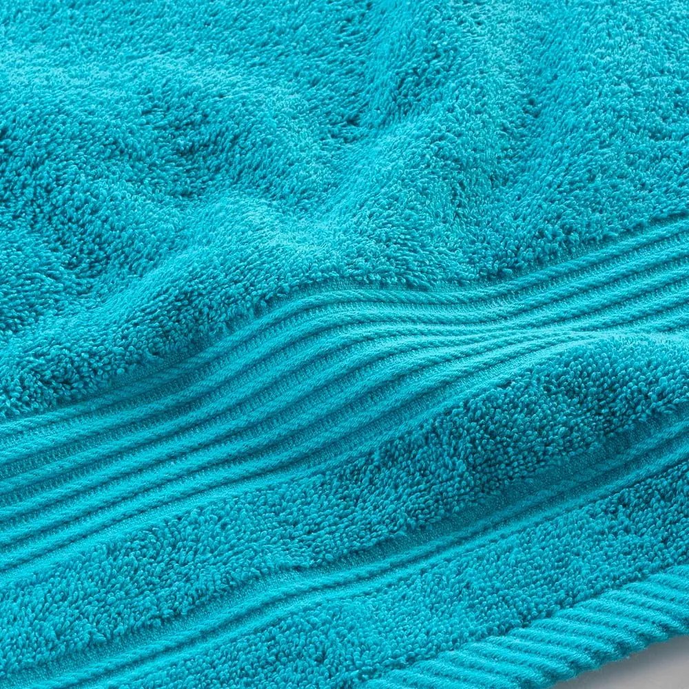 Niebieski bawełniany ręcznik frotte 50x90 cm Tendresse – douceur d'intérieur
