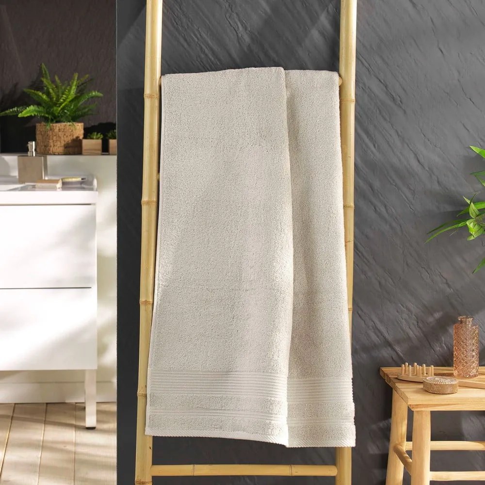 Beżowy bawełniany ręcznik kąpielowy frotte 70x130 cm Tendresse – douceur d'intérieur