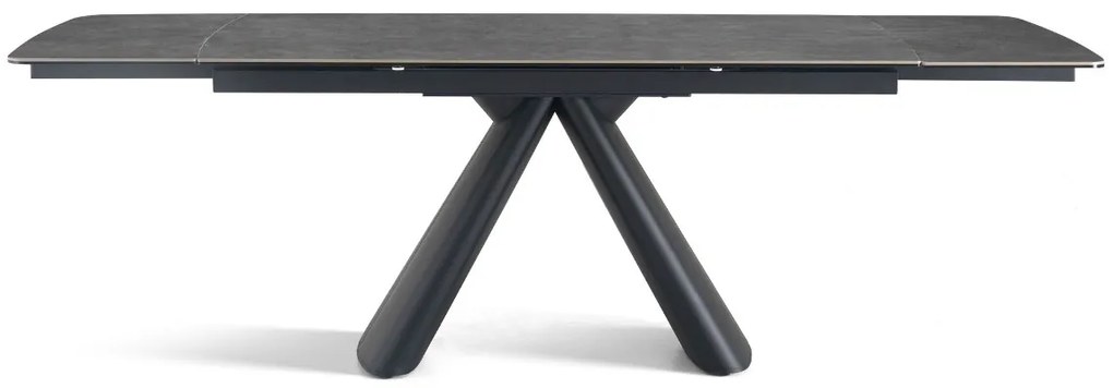 Elegancki stół z szarym ceramicznym blatem na hartowanym szkle. Metalowa podstawa z czarnej stali nadaje mu nowoczesny charakter i wyjątkową trwałość.