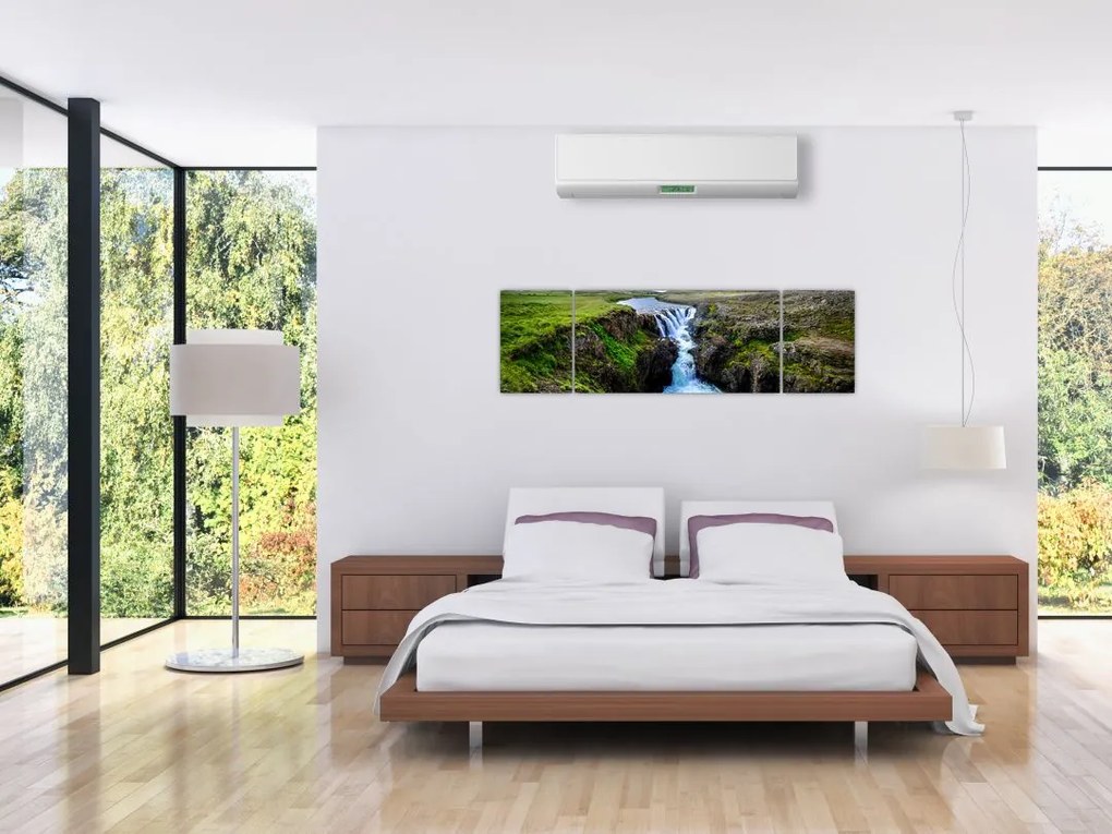 Obraz wodospadu między skałami (170x50 cm)