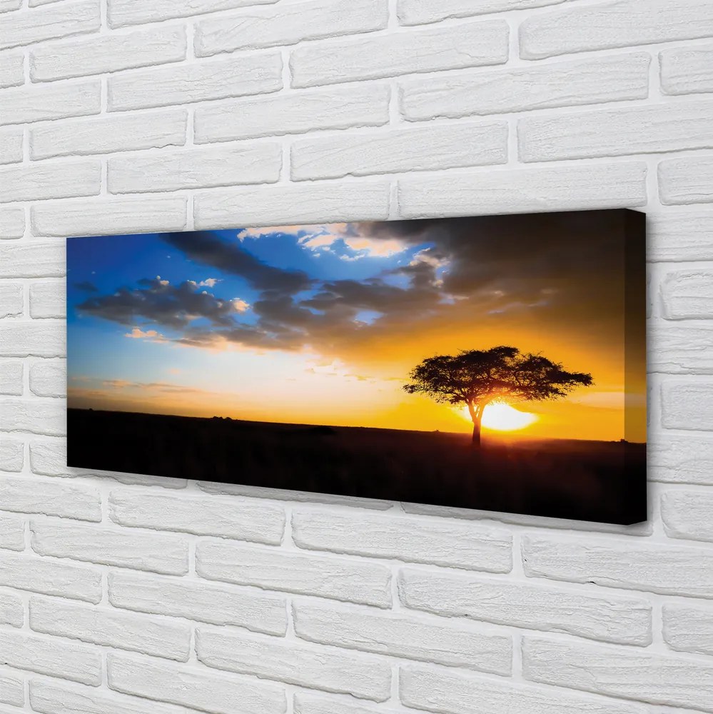 Obraz na płótnie Drzewo na Tle Chmur