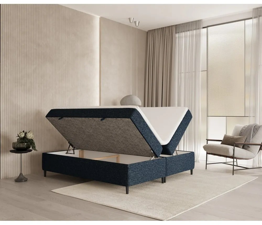 Ciemnoniebieskie łóżko boxspring ze schowkiem 140x200 cm Araya – Maison de Rêve