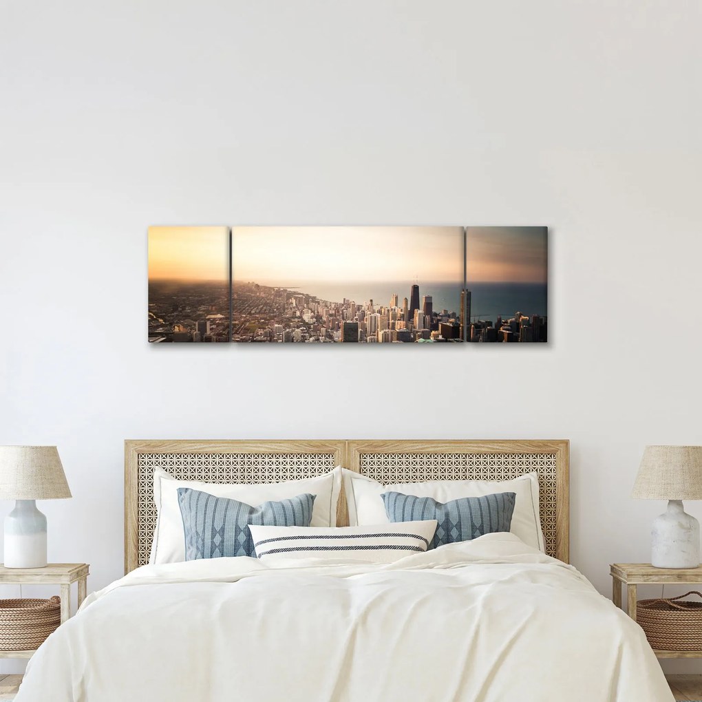 Obraz zachodu słońca nad miastem (170x50 cm)