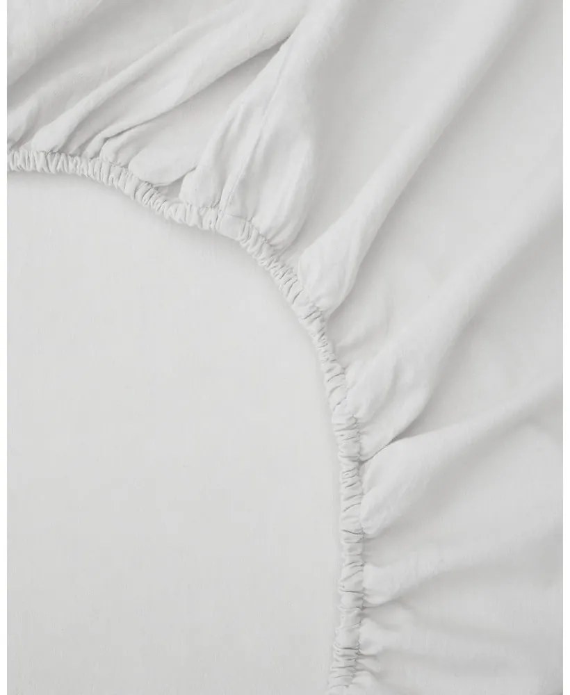 Białe prześcieradło z perkalu bawełnianego z gumką 70x140 cm Fleno – Kave Home