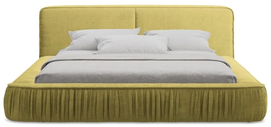 Żółte tapicerowane łóżko dwuosobowe ze schowkiem i stelażem 180x200 cm Keoni – Makamii