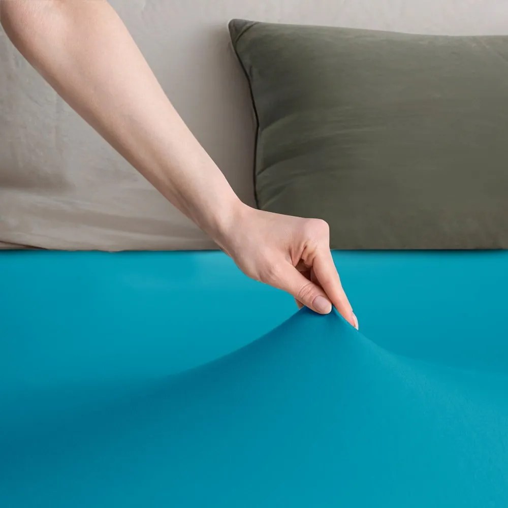 Niebieskie dżersejowe prześcieradło z gumką 120x200 cm Amber – Restilo