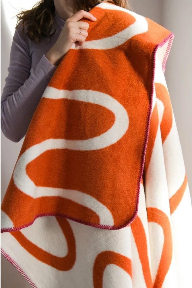 Pomarańczowy koc 150x200 cm Swirl – noo.ma
