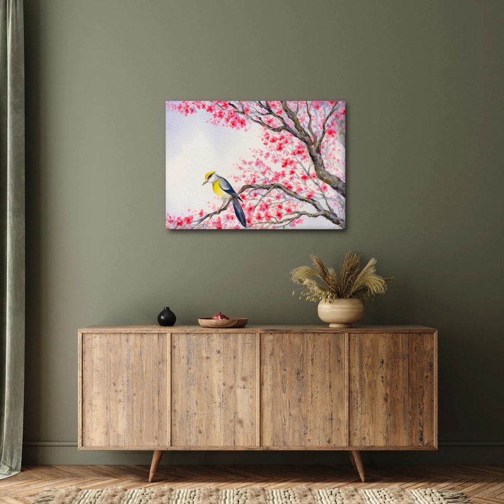 Obraz - ptak na drzewie z czerwonymi kwiatami (70x50 cm)