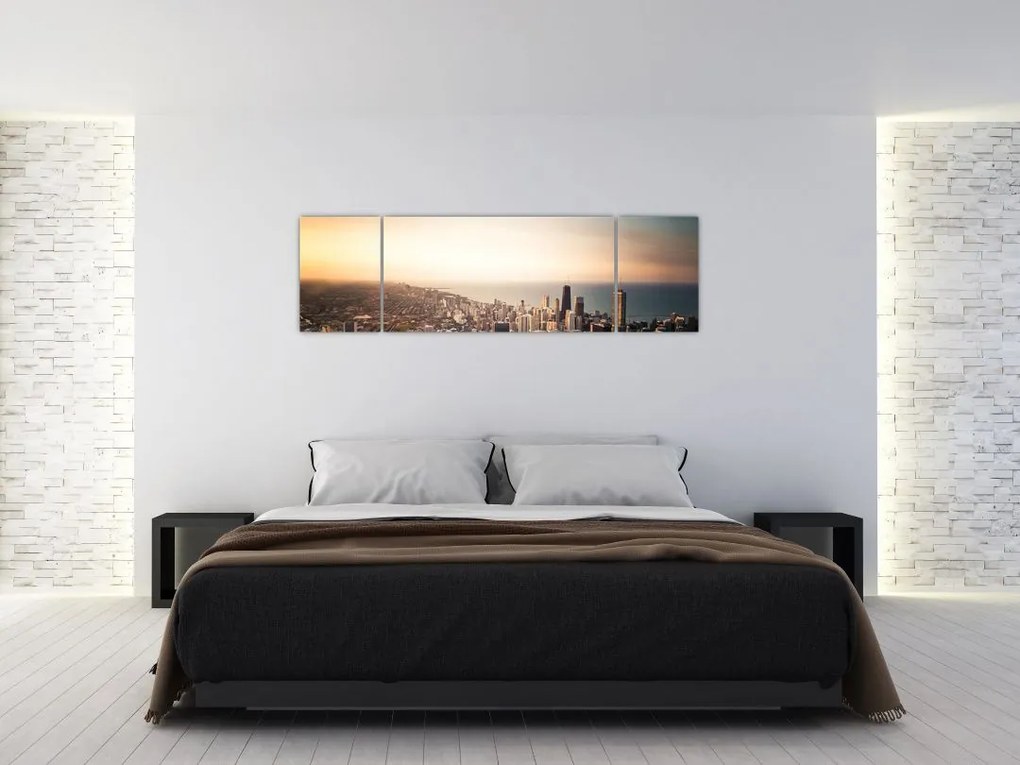 Obraz zachodu słońca nad miastem (170x50 cm)