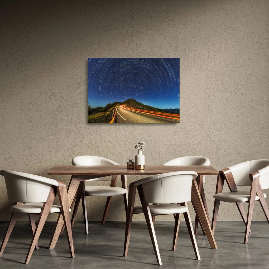 Obraz na szkle obracających się gwiazd (70x50 cm)