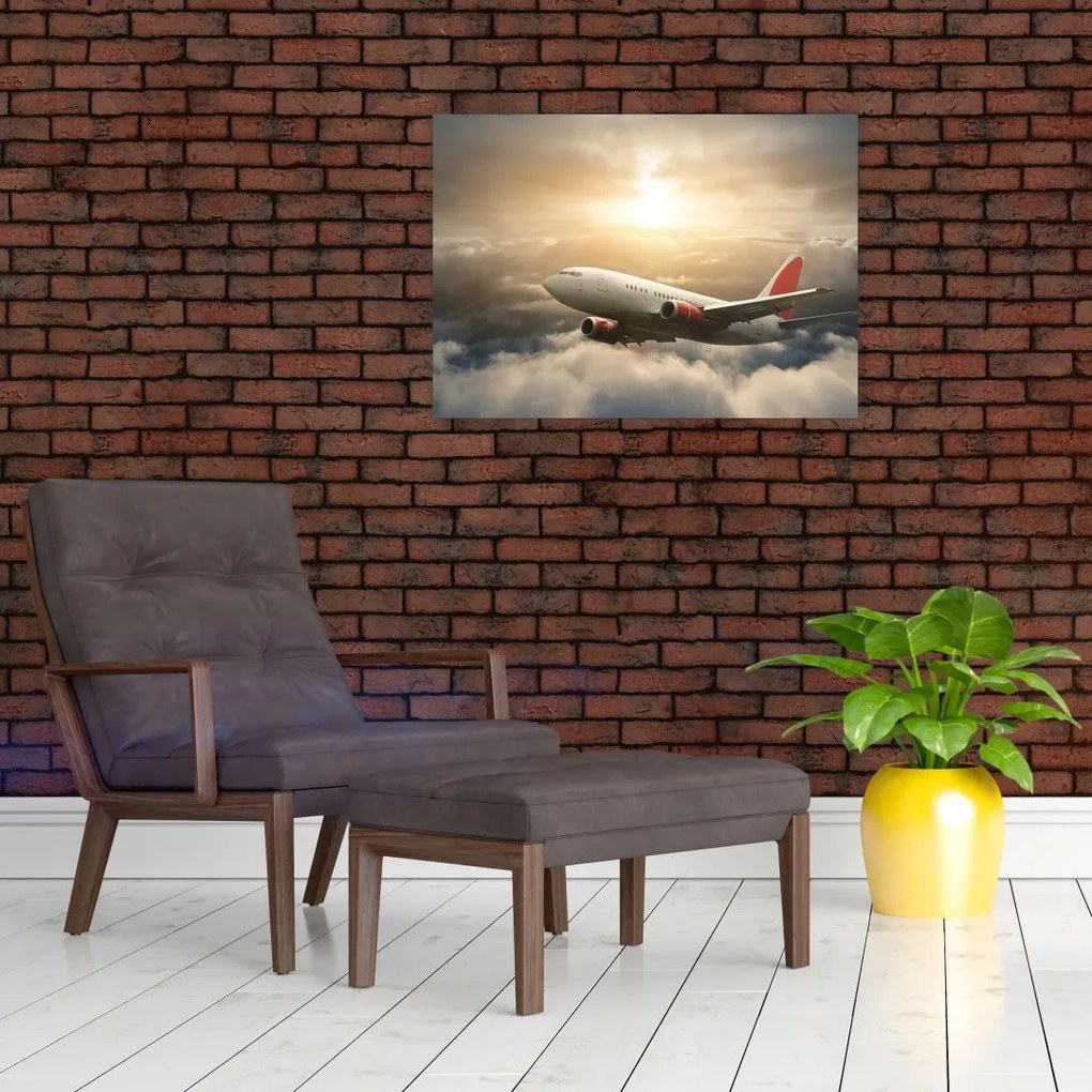 Obraz na szkle - Samolot w chmurach (70x50 cm)