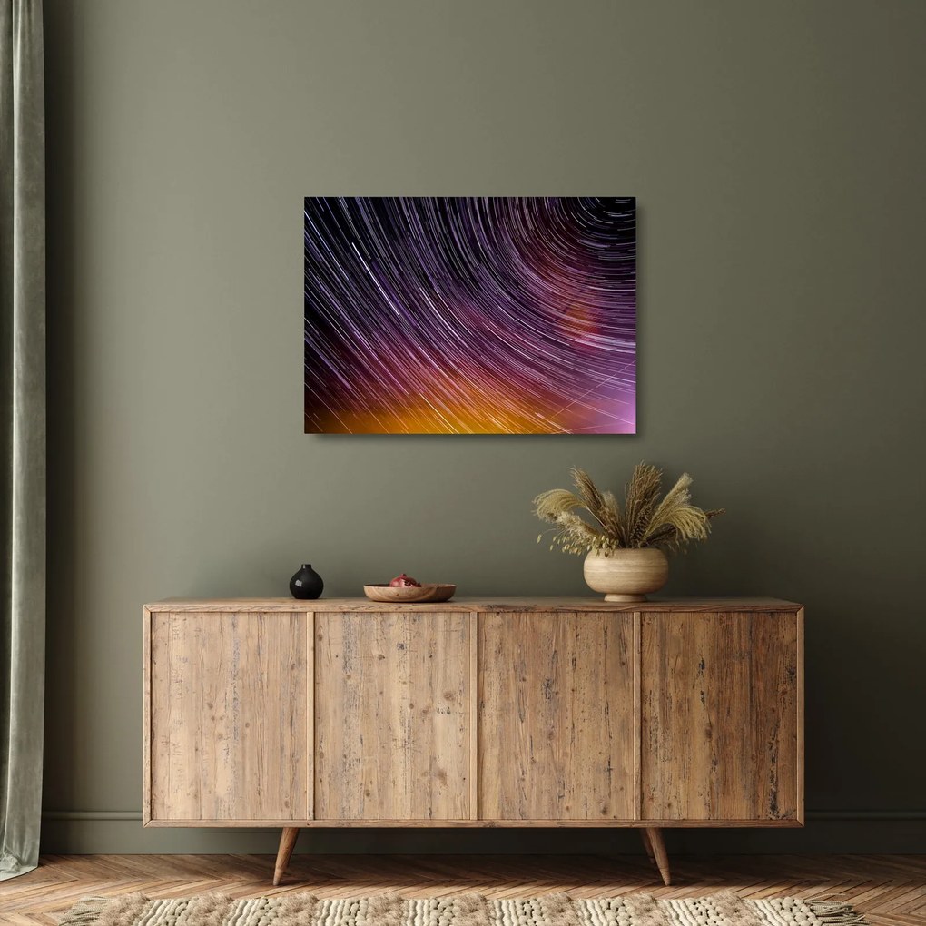 Obraz na szkle - rozmyte gwiazdy na niebie (70x50 cm)
