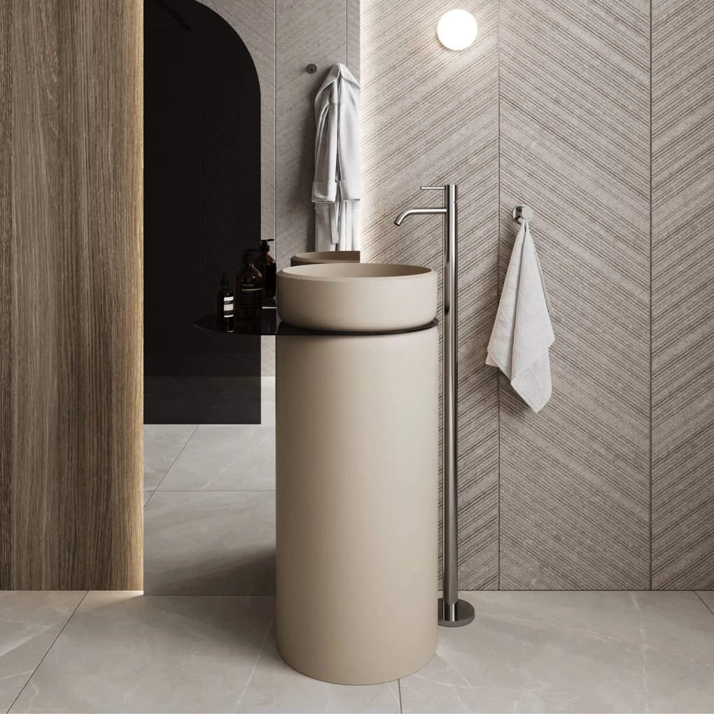 Umywalka z konglomeratu wolnostojąca okrągła z półką szklaną 85 x 40 cm RONA bez przelewu | Różne kolory półki : Kolor szkła - Czarny, Kolor umywalki RONA - Beż matowy, Podłączenie syfonu - Do ściany, Półka - Szklana